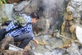 The tourist boiling eggs in hot sea park,tengchong,china