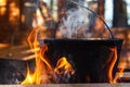 Tourist bowler with food on bonfire, cooking in the hike, outdoor activities. Preparation of pilaf. Royalty Free Stock Photo