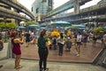 Tourist buddhist paying respect on Ratchaprasong Erawan shrine