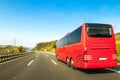 Tourist bus on asphalt freeway road in beautiful spring day at c Royalty Free Stock Photo