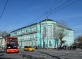 Tourist bus at the building of the art gallery Ilya Glazunov in Moscow.