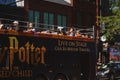 Tourist bus with Harry Potter logo on a tour with the city in the background, Toronto, Canada Royalty Free Stock Photo