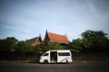 A bus parked outside the temple