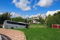 Tourist bus on the road in front of the Trinity Lavra of St.Sergius. Sergiyev Posad, Russia Royalty Free Stock Photo