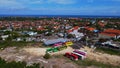 Tourist buses visiting Puja Mandala Worship Complex with Indian Ocean background view in Nusa Dua, Bali Island Royalty Free Stock Photo