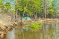 Tourist camp on the banks of the river during the spring flood Royalty Free Stock Photo