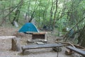 Tourist camping tent in the campgrounds in the woods Royalty Free Stock Photo