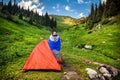 Tourist in Camping Tent