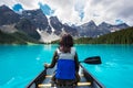 Tourist Canoeing on Moraine Lake in Banff National Park, Canadian Rockies, Alberta, Canada Royalty Free Stock Photo