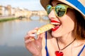 Tourist with cantuccini cookie in florence