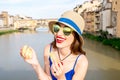 Tourist with cantuccini cookie in florence