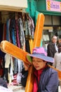 Tourist carrying the cross