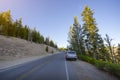 Tourist cars parking along the scenic highway Rim Drive in Crater Lake