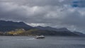 A tourist catamaran sails along the Beagle Channel.