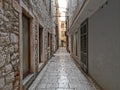 Tourist city by the Adratic sea - Sibenik, Croatia. The old stones, narrow street and stairs