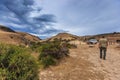 A tourist climbs up the slope on the way to his car at Deep Creek Conservation Park, Fleurieu Peninsula, South Australia