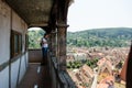 Tourist in The Clock Tower in Sighisoara, Romania Royalty Free Stock Photo