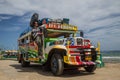 Tourist on a colourful Jeepney