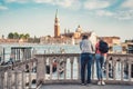 Tourist couple enjoying the idyllic scene on Grand Canal in Venice