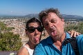 Tourist couple makes funny face taking selfie during vacation in Cavaillon France