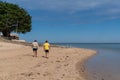 Tourist couple in sand tourism beach Atlantic ocean in Ile de Noirmoutier France