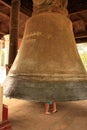 Tourist couple standing inside Mingun bell, Mandalay region, Myanmar Royalty Free Stock Photo