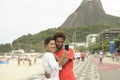 Tourist couple taking a self portrait in Rio de Janeiro