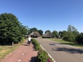 Tourist cycling through the village Beerze Royalty Free Stock Photo