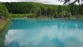 A tourist destination in Japan. A blue pond in Biei, Hokkaido. The dead larch is fantastic.