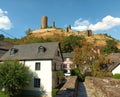 Tourist destination Monreal in rhineland-palatinate with half-timbered houses and ruin of castle Loewenburg Royalty Free Stock Photo