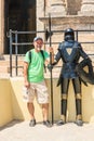 Tourist with a dummy knight in Rhodes Old Town fortress. Rhodes.