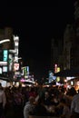 A tourist eating at the Liuhe night market in Kaohsiung