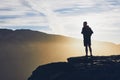 Tourist on the edge of cliff