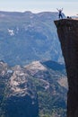 A tourist at the edge of the Pulpit Rock