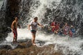 Tourist enjoy the beautiful of Lasir waterfall, Kenyir Lake, Terengganu. Lasir waterfall also