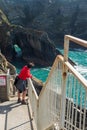 Tourist enjoy view of Mizen head in county Cork