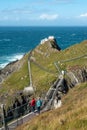 Tourist enjoy view of Mizen head in county Cork