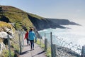 Tourist enjoy view of Mizen head in county Cork