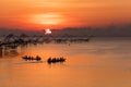 Tourist enjoy watching fishing net and beautiful sunrise, Phatthalung province Thailand