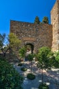 Tourist enjoying the gardens of the Alcazaba arab castle in Malaga