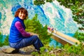 Tourist enjoying mountains fjord view, Norway Royalty Free Stock Photo