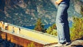 Tourist enjoying mountains fjord view, Norway Royalty Free Stock Photo