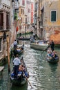 Tourist enjoying a ride on a Gondola, Venice Italy Europe