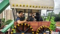 Tourist enjoying ride wagon wheel or ferris wheel at Sunway Lagoon theme park in Bandar Sunway