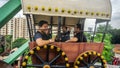 Tourist enjoying ride wagon wheel or ferris wheel at Sunway Lagoon theme park in Bandar Sunway