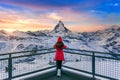 Tourist enjoying view at Matterhorn and swiss alps in Zermatt, Switzerland Royalty Free Stock Photo