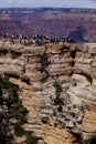 Tourist enjoying the view of the west rim of The Grand Canyon Royalty Free Stock Photo