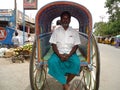 Palani, Tamilnadu, India-Jun 21 2013:A tourist enjoys his horse ride on Palani hills murugan temple