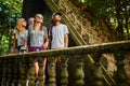 Tourist exploring ancient jungle ruins in tropical rain forest Royalty Free Stock Photo