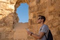 Young man exploring the ruins of masada in israel